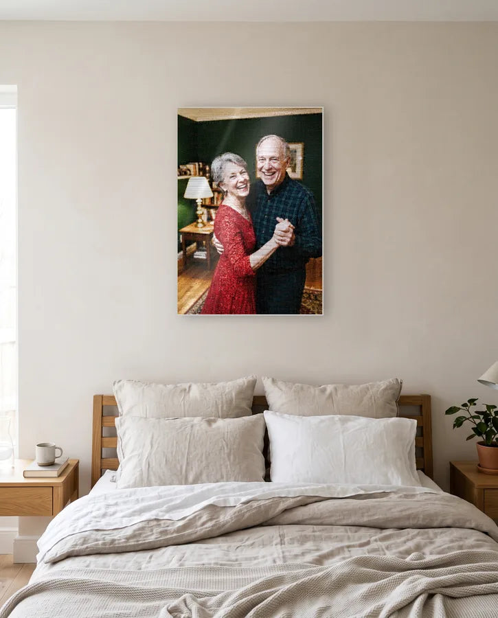 Photo mosaic of an older couple dancing together, on aluminium above a bed