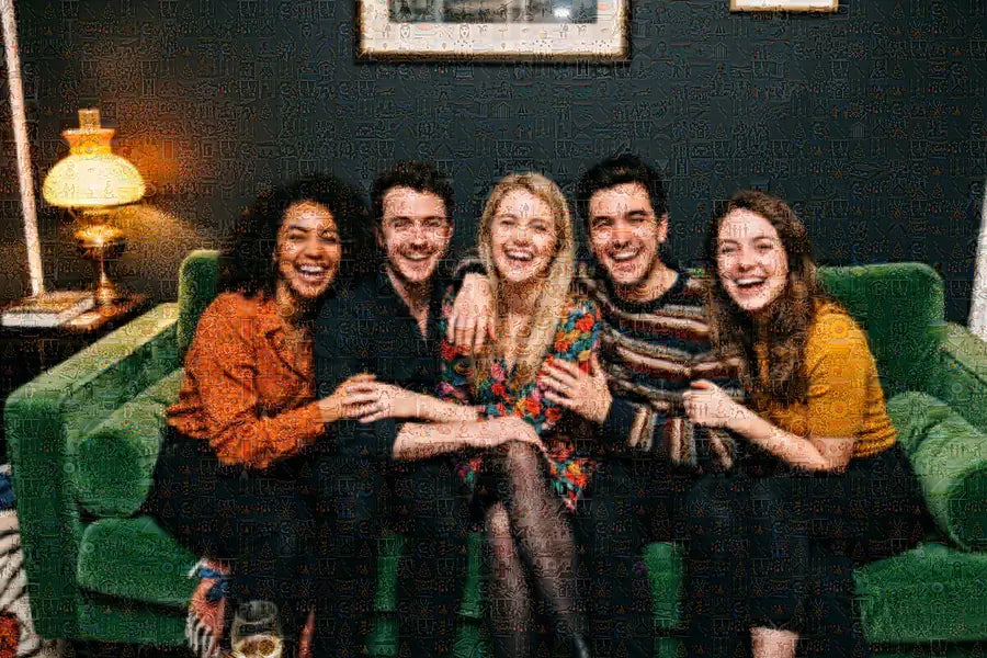 Photo mosaic of five friends on a green sofa, made up of hundreds of small photos