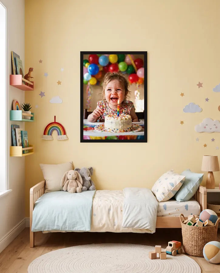Photo mosaic of a toddler with a birthday cake, framed in a child's bedroom